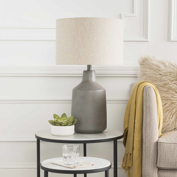 Concrete-Finish Linen Shade Table Lamp — Stone-finish base and woven drum shade for quiet, diffused evening light
