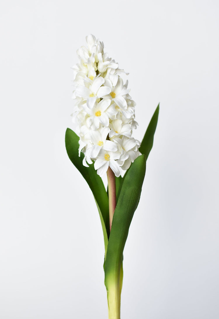 Soft White Faux Hyacinth Stem — White faux hyacinth stem with textured petals and deep-green leaves