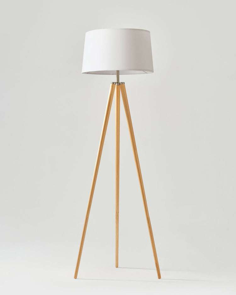 Linen Shade Tripod Floor Lamp — Tapered tripod floor lamp with fabric shade and warm wood-finish legs