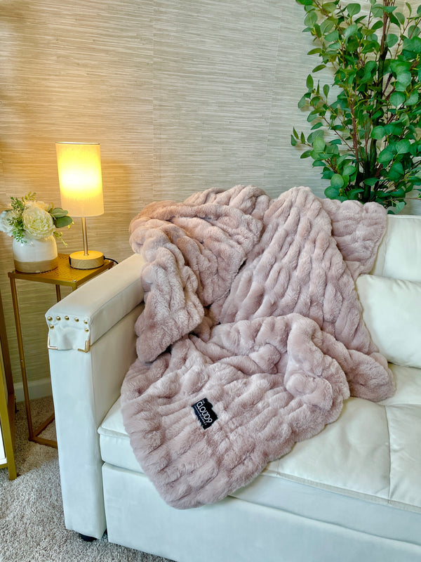 Channeled Faux Fur Throw Blanket — Channeled faux fur throw in a quiet rose-gray blush, dense pile with gentle stretch