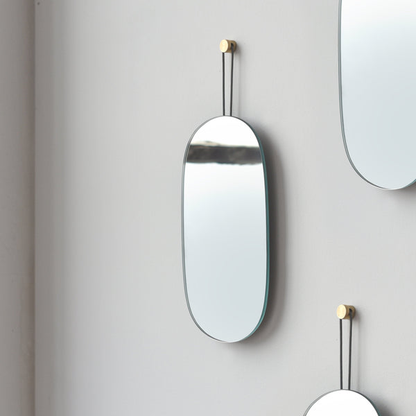 Close-up of glass clarity and rim detail — Brass-Hung Oval Wall Mirror