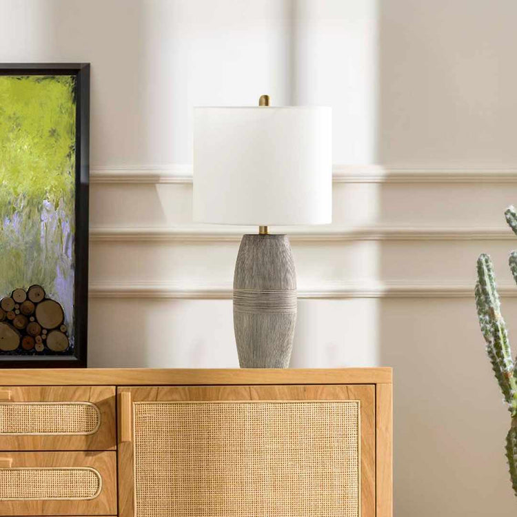 Ribbed Ceramic Table Lamp — Ribbed ceramic base in ash-grey with brass column and white fabric shade