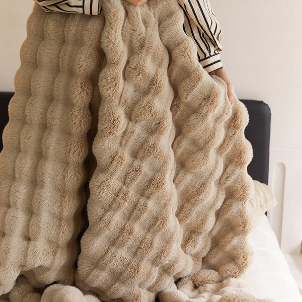 Sculpted Bubble-Pile Plush Throw — Sculpted faux-fur throw with bubble-channel texture and solid woven reverse