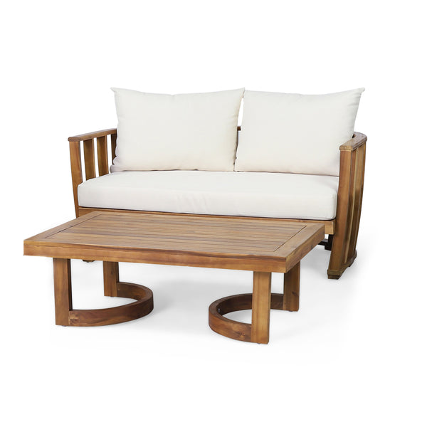 Acacia Wood Outdoor Loveseat Set styled in an outdoor living space