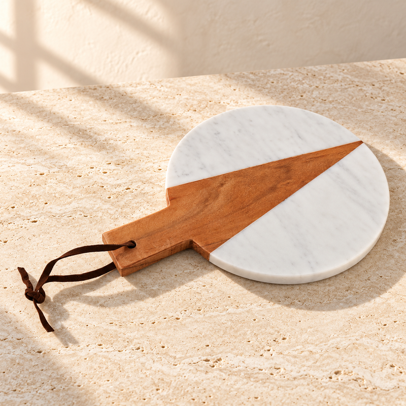Marble and Wood Round Serving Platter on a sunlit pale travertine counter