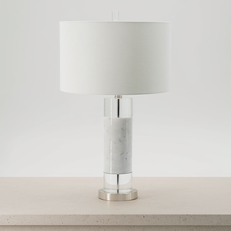 Marble and Crystal Column Table Lamp on a neutral concrete tabletop