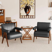 Black Leather Mid-Century Armchair Pair (view 8) | Roost & Roam