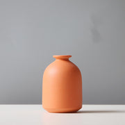 Matte Ceramic Sculptural Vase — packaging and unboxing view