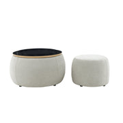 Upholstered Round Storage Ottoman Table — styled in a complete room vignette