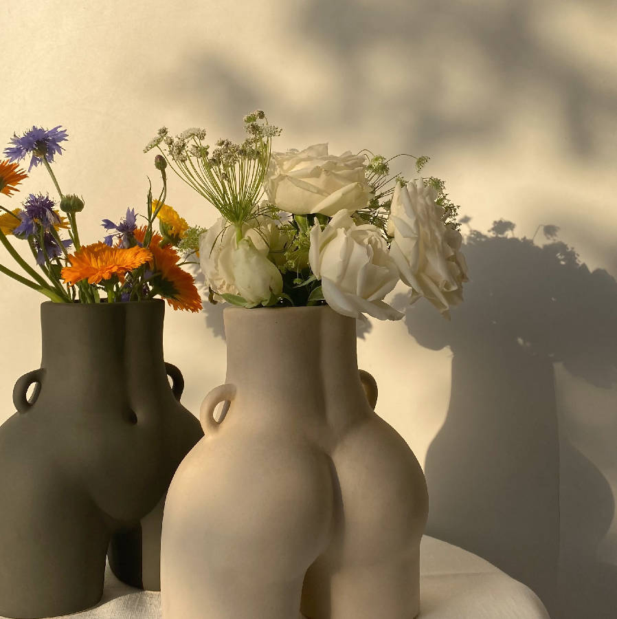 The vase that holds the room before flowers arrive