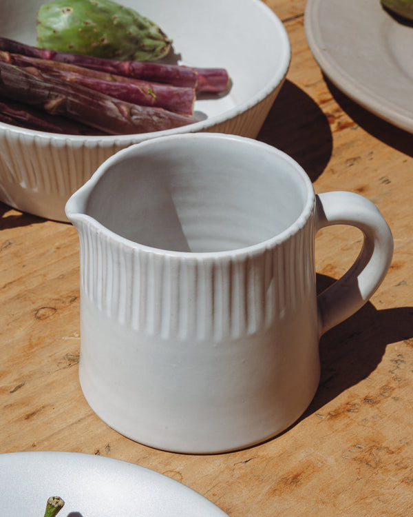 Hand-Carved Ceramic Serving Pitcher