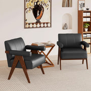 Black Leather Mid-Century Armchair Pair (view 3) | Roost & Roam
