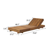 Slatted Acacia Wood Outdoor Chaise Lounger styled in an outdoor living space