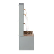 Leaf Cutout Metal Outdoor Water Fountain — styled in a complete room vignette