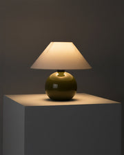 Glossy Ceramic Globe Table Lamp — scale reference and proportion detail