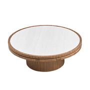 Sintered Stone Round Pedestal Coffee Table — styled in a complete room vignette