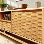 Close-up of carved leg and joinery detail — Relief-Carved Wood TV Stand