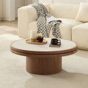 Sintered Stone Round Pedestal Coffee Table styled with ceramics and a linen runner