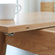 Extendable Oak Dining Table — detail of finish and surface variation