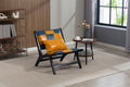 Patchwork Leather Sling Accent Chair — Low-slung sling chair in patchwork amber and slate with dark wood frame