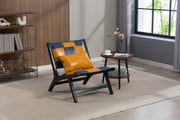 Patchwork Leather Sling Accent Chair — Low-slung sling chair in patchwork amber and slate with dark wood frame