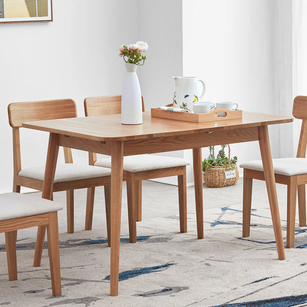 Extendable Oak Dining Table styled in an outdoor dining setting