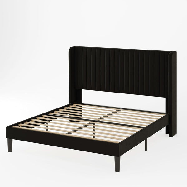 Black wingback bed frame shown diagonally without a mattress to reveal the slatted base.