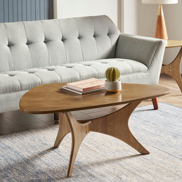 Triangle-Top Cross-Base Wood Coffee Table — Solid wood coffee table with triangular top and sculpted cross base