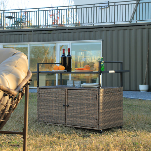 Woven Wicker Outdoor Bar Cart — Wicker and glass outdoor bar cart with cabinet storage and casters