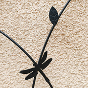 Dragonfly Motif Metal Garden Trellis Pair — styled in a complete room vignette