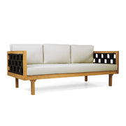 Rope-Woven Acacia Outdoor Daybed styled in an outdoor living space