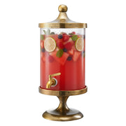 Gold-Finish Glass Beverage Dispenser — Gold-finish glass dispenser with aged metal pedestal base and spigot