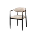 Open-Back Upholstered Dining Armchair Set styled in an outdoor dining setting