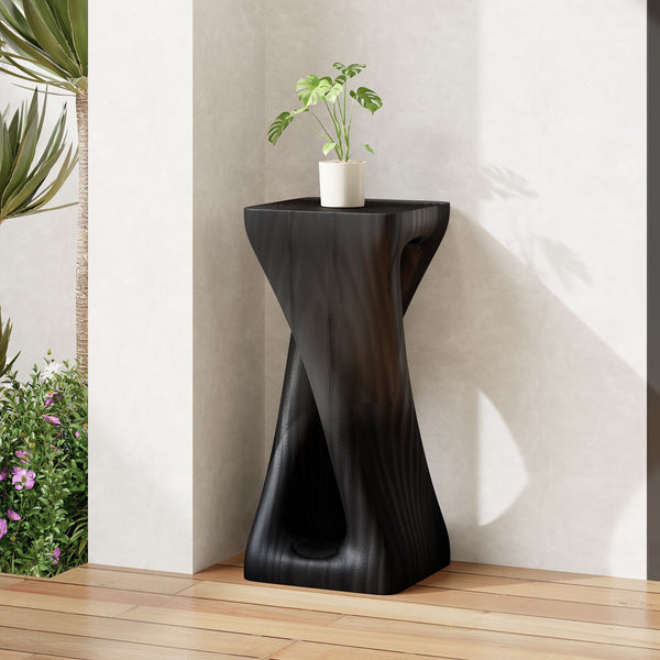 Sculptural Twist Concrete Side Table styled with ceramics and a linen runner