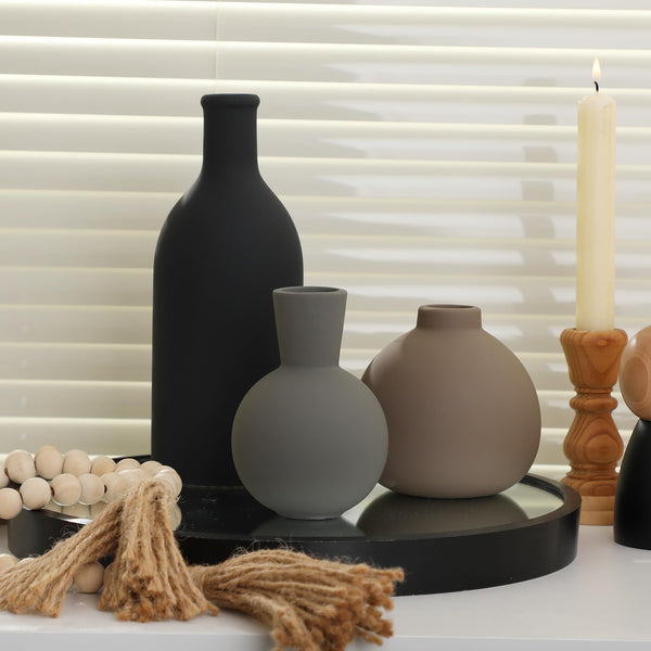 Matte Ceramic Vase Set styled with dried botanicals on a shelf
