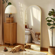 Gold Arch Full-Length Floor Mirror — styled in a complete room vignette