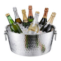 Hammered Stainless Steel Ice Bucket in a styled home setting