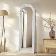 Arched Wood-Grain Floor Mirror — styled in a complete room vignette