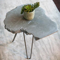 Live-Edge Concrete Side Table — Cast concrete live-edge slab top on hairpin legs, available in four finishes