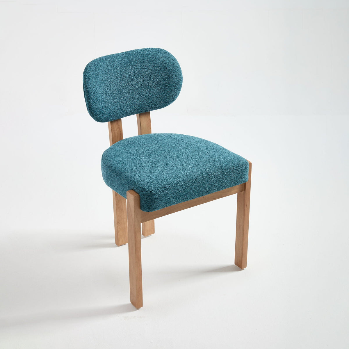 The seat everyone gravitates toward at the table.