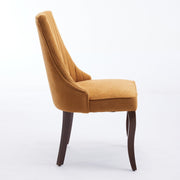 Channel-Tufted Ochre Upholstered Dining Chairs — styled in a complete room vignette