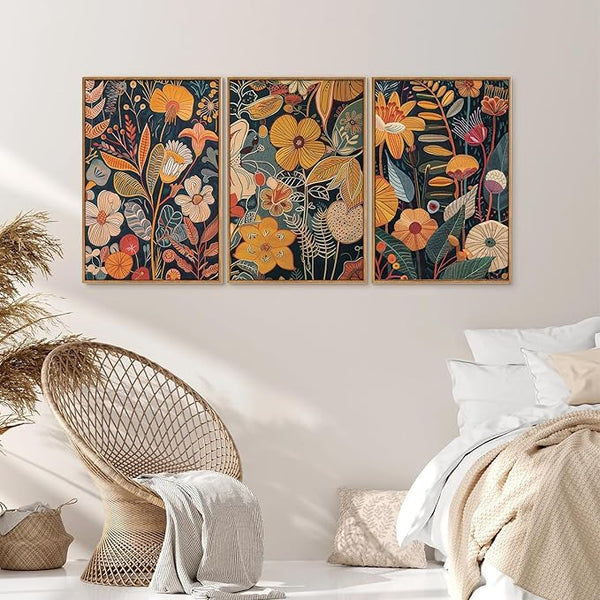 Three burnt orange Burnt Orange Botanical Canvas Wall Art prints with botanical floral designs