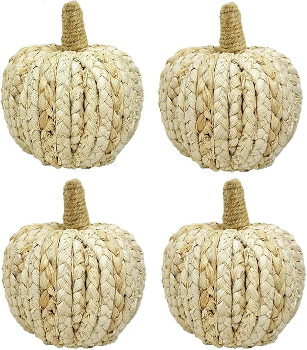 Four tan pumpkins with braided texture, round