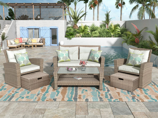 All-Weather Woven Rattan Seating Set — Six-piece woven rattan set with cushions, armchairs, ottomans, and glass-top table