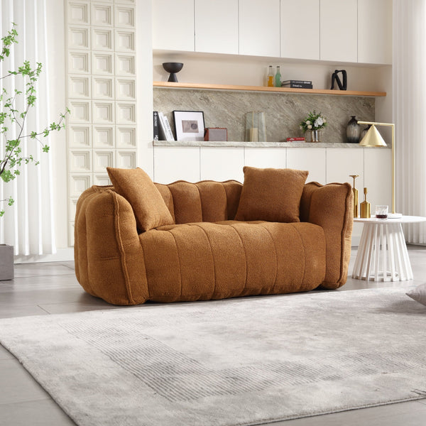 Channel-Tufted Boucle Loveseat Sofa styled with cushions on a terrace setting