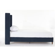 Tufted Velvet Wingback Queen Bed — close-up of label and production detail