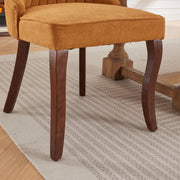 Channel-Tufted Ochre Upholstered Dining Chairs — back and side profile detail