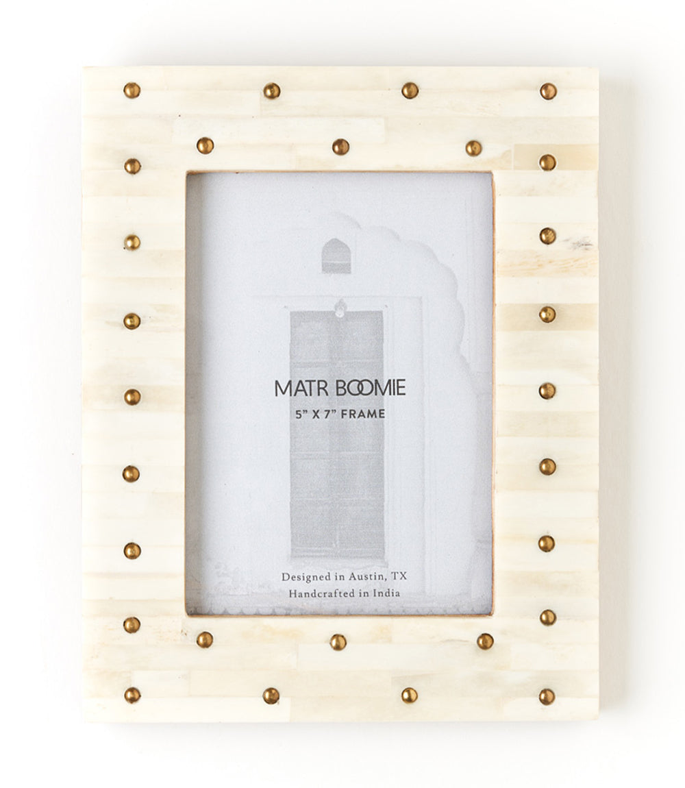 A handmade frame that holds the photo gently