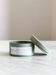Oakmoss & Cedarwood COconut Creme Wax & Wooden Wick Candle styled on a table with linen and ceramics