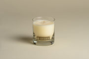 Elderberry Jasmine Citrus Hand-Poured Soy Candle styled on a table with linen and ceramics